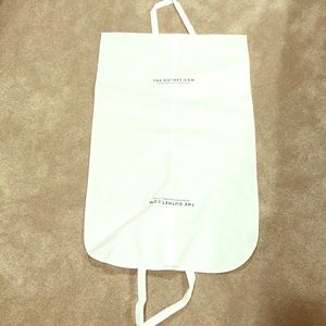 The Outnet white garment bag. NWOT